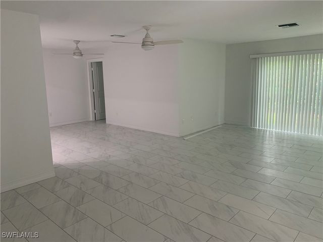 310 Carnaby CT, Naples, FL 34112