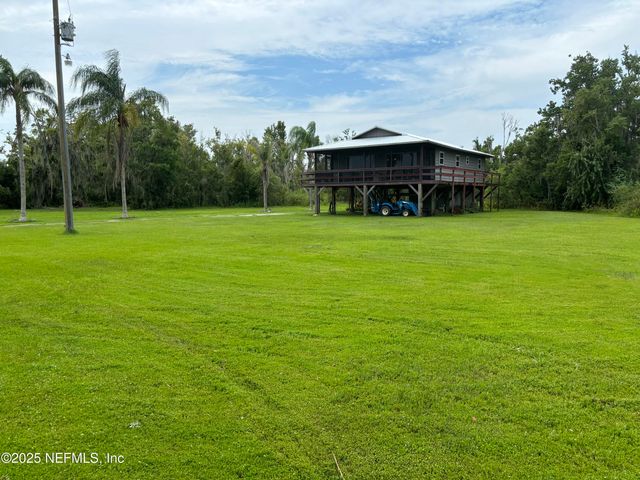 6001 BIRD ISLAND Drive, Lady Lake, FL 32159