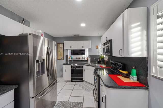 15035 NW 88th Ct, Miami Lakes, FL 33018