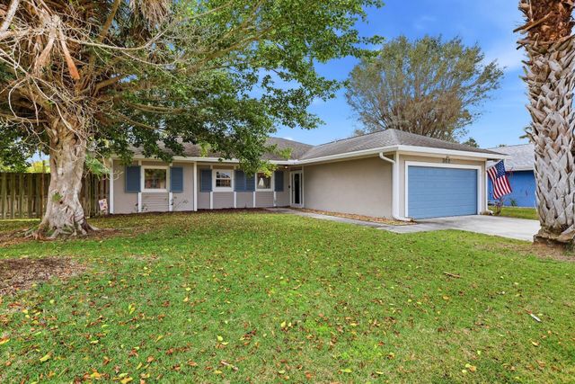 362 La Mancha Avenue, Royal Palm Beach, FL 33411