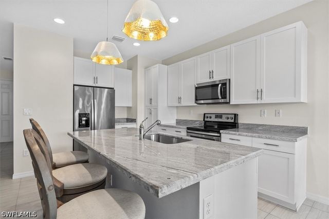 8968 Madrid CIR, Naples, FL 34104