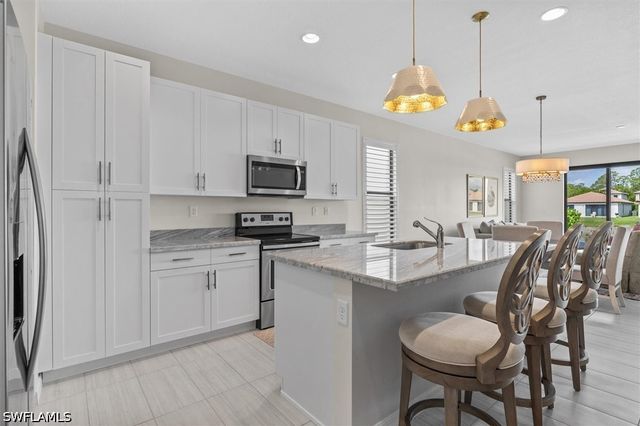 8968 Madrid CIR, Naples, FL 34104