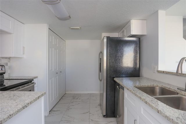 202 WASHINGTON PALM LOOP, Davenport, FL 33897