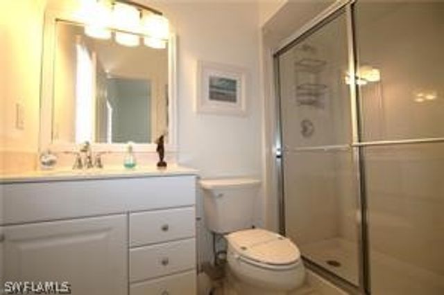 11002 Vanderbilt DR, Naples, FL 34108