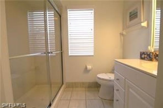 11002 Vanderbilt DR, Naples, FL 34108