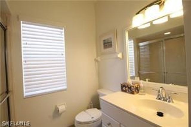 11002 Vanderbilt DR, Naples, FL 34108