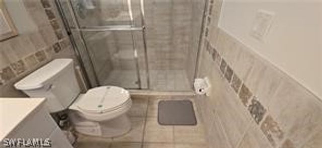11002 Vanderbilt DR, Naples, FL 34108
