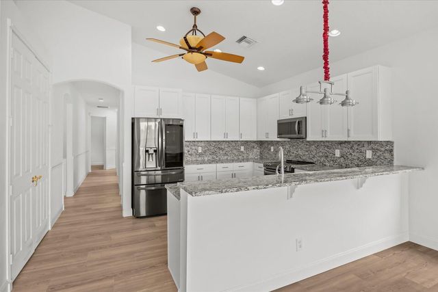 7558 Tarpon Cove Circle, Greenacres, FL 33467