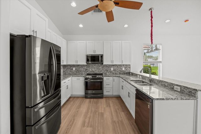 7558 Tarpon Cove Circle, Greenacres, FL 33467