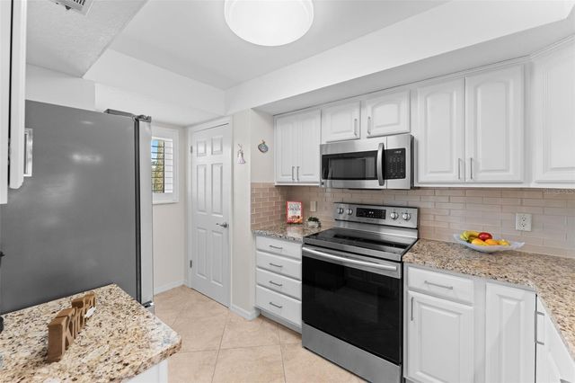 3873 S BANANA RIVER BOULEVARD 103, Cocoa Beach, FL 32931