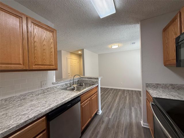 8911 SCHICK RD B, Austin, TX 78729