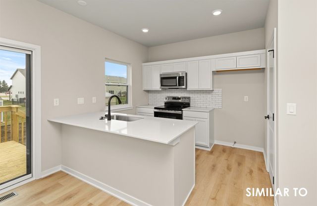 1004 Featherstone Avenue NE, Bondurant, IA 50035