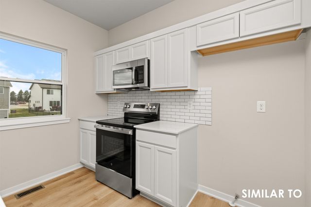 1004 Featherstone Avenue NE, Bondurant, IA 50035