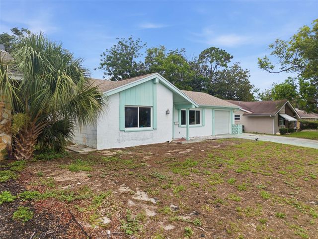 12305 PARTRIDGE HILL ROW, Hudson, FL 34667