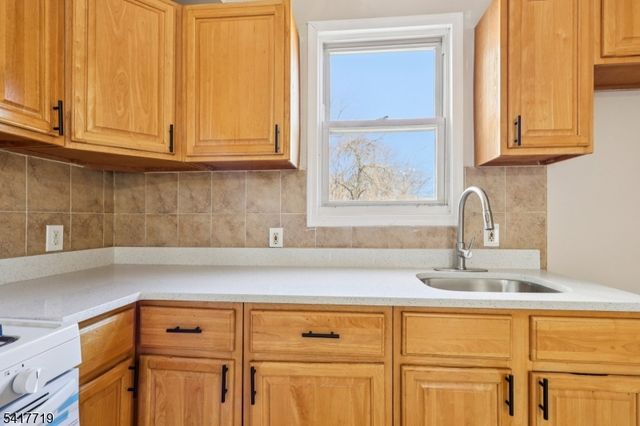 106 E Main St, Paterson City, NJ 07522