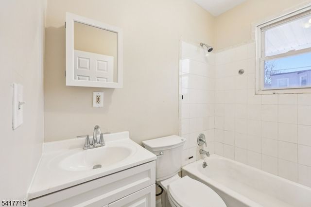 106 E Main St, Paterson City, NJ 07522