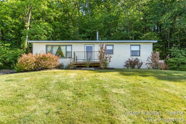 9089 Fulton Street, Ada, MI 49301