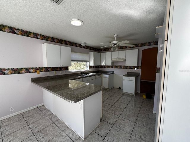 144 COSTA MESA DRIVE, Lady Lake, FL 32159