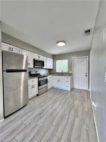 142 Harry AVE S, Lehigh Acres, FL 33973