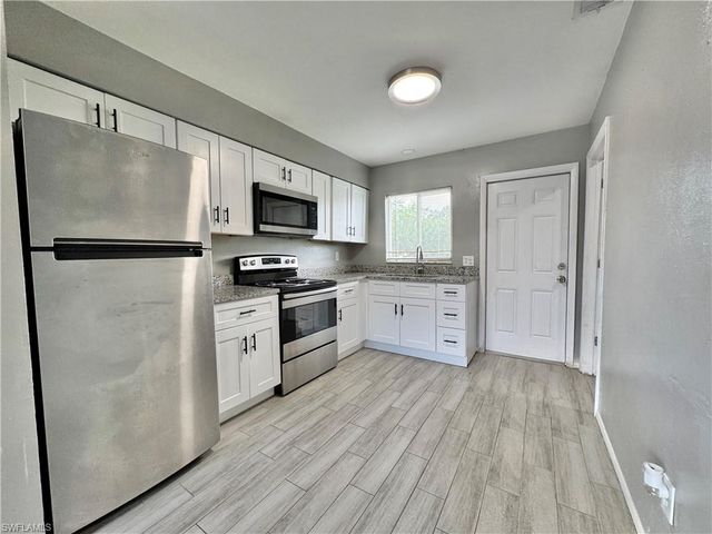 142 Harry AVE S, Lehigh Acres, FL 33973
