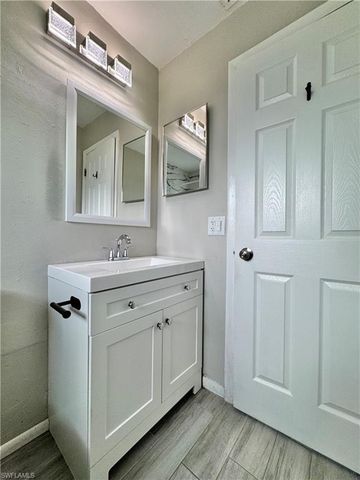 142 Harry AVE S, Lehigh Acres, FL 33973