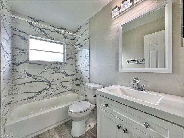142 Harry AVE S, Lehigh Acres, FL 33973