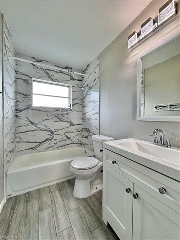 142 Harry AVE S, Lehigh Acres, FL 33973