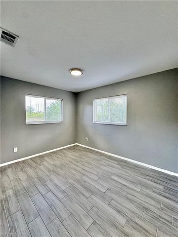 142 Harry AVE S, Lehigh Acres, FL 33973