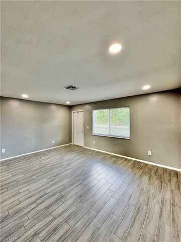 142 Harry AVE S, Lehigh Acres, FL 33973