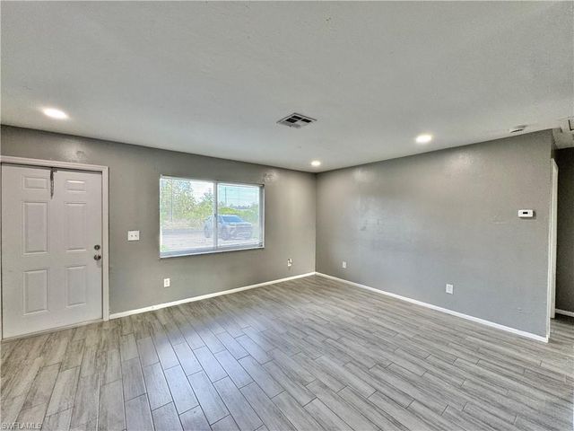 142 Harry AVE S, Lehigh Acres, FL 33973