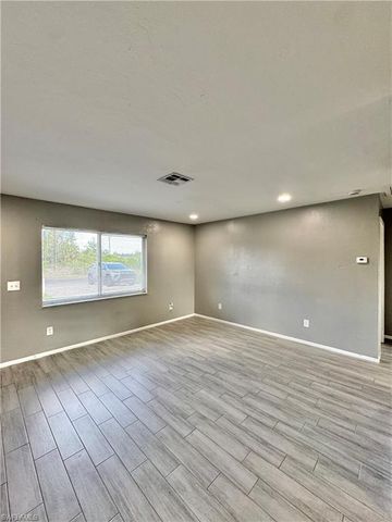 142 Harry AVE S, Lehigh Acres, FL 33973