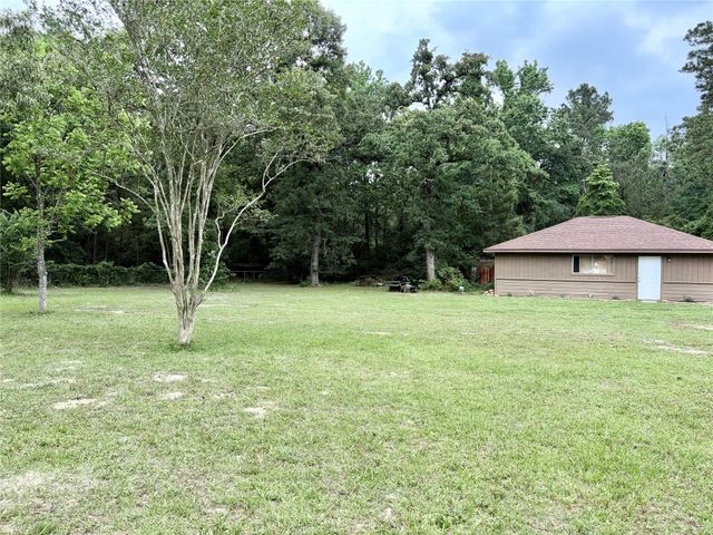 14437 Jack Gibbs Road, Willis, TX 77378