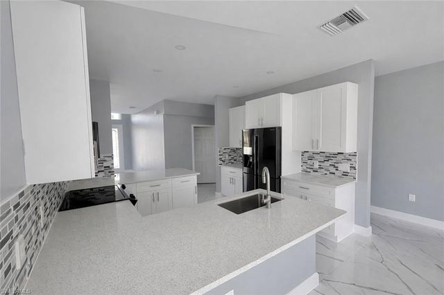 52 Paula AVE S, Lehigh Acres, FL 33976