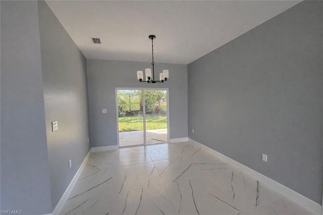 52 Paula AVE S, Lehigh Acres, FL 33976