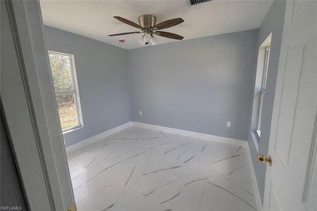 52 Paula AVE S, Lehigh Acres, FL 33976