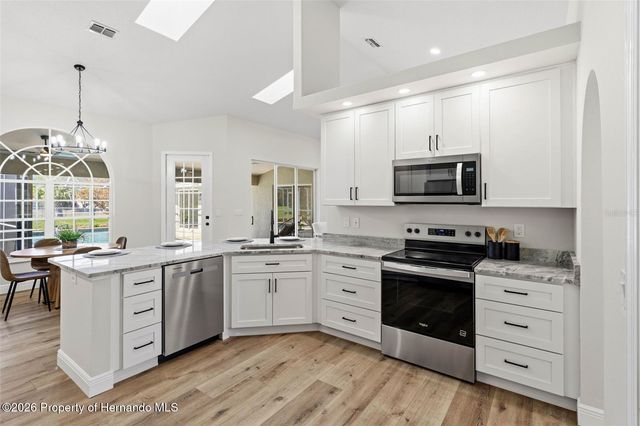 10185 Sleepy Willow Court, Spring Hill, FL 34608