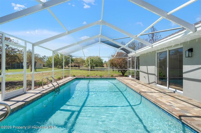 10185 Sleepy Willow Court, Spring Hill, FL 34608