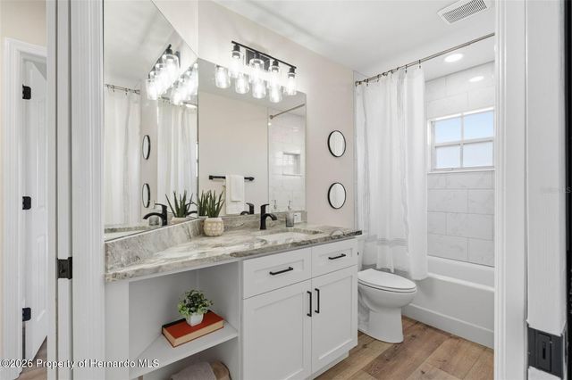 10185 Sleepy Willow Court, Spring Hill, FL 34608