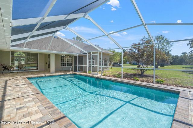 10185 Sleepy Willow Court, Spring Hill, FL 34608