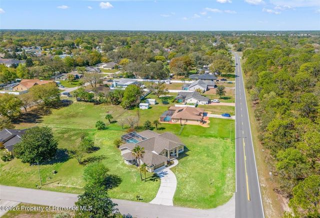 10185 Sleepy Willow Court, Spring Hill, FL 34608