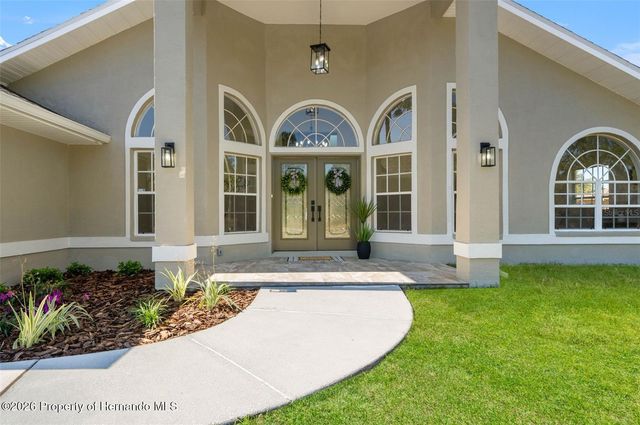 10185 Sleepy Willow Court, Spring Hill, FL 34608