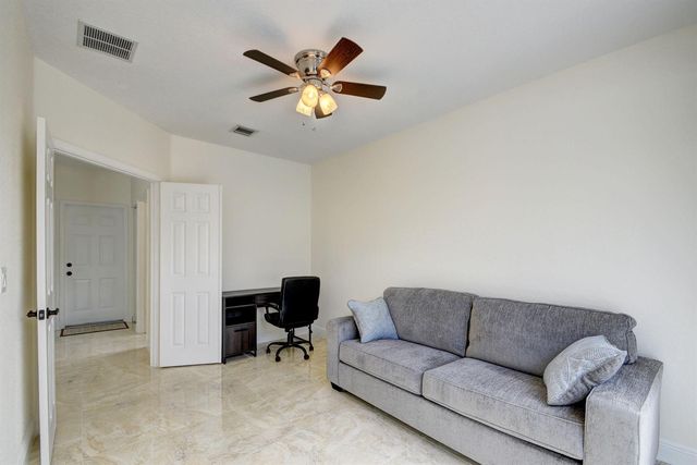 2418 Westmont Drive, Royal Palm Beach, FL 33411