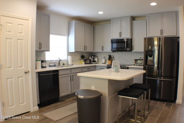 1503 Musgrass Circle, West Melbourne, FL 32904