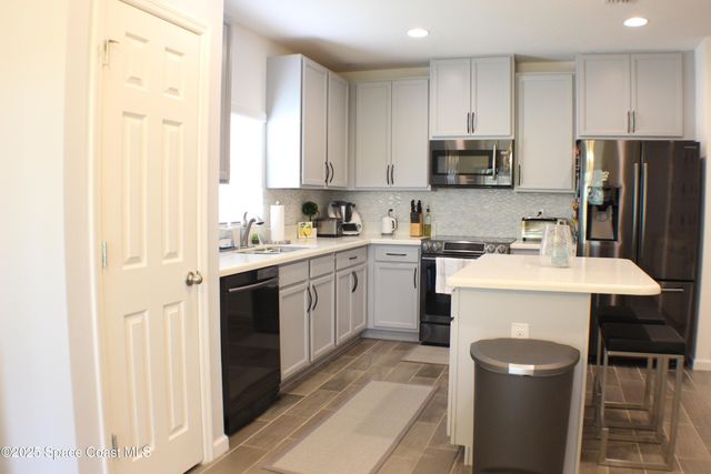 1503 Musgrass Circle, West Melbourne, FL 32904