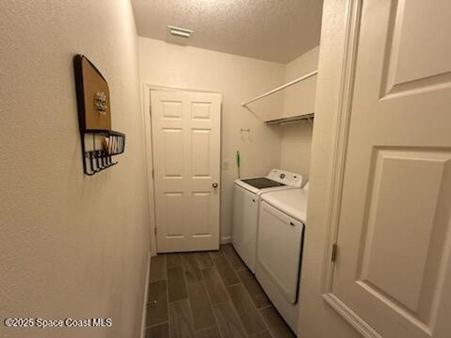 1503 Musgrass Circle, West Melbourne, FL 32904
