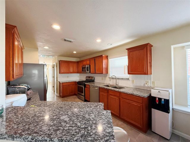 9106 S Ferndale Place Drive, Houston, TX 77064