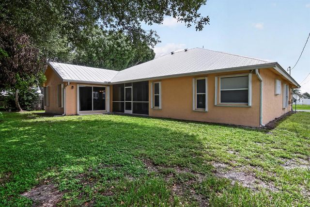 3408 SW Funtuna Street, Port St. Lucie, FL 34953