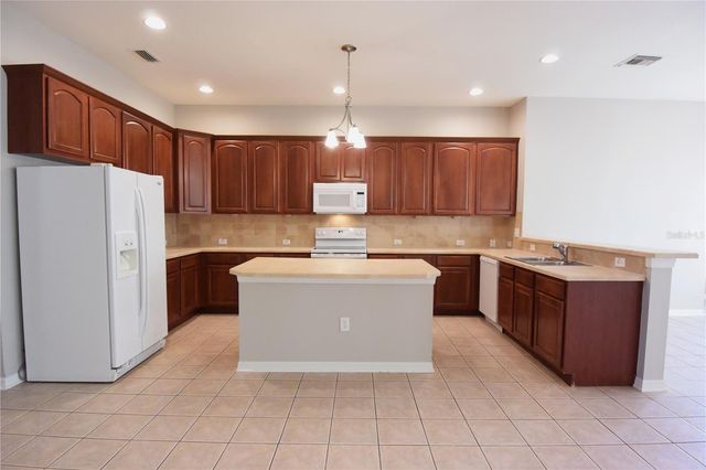 7015 CARDINALWOOD LANE, Land O Lakes, FL 34637