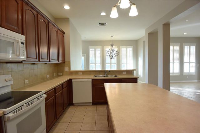 7015 CARDINALWOOD LANE, Land O Lakes, FL 34637