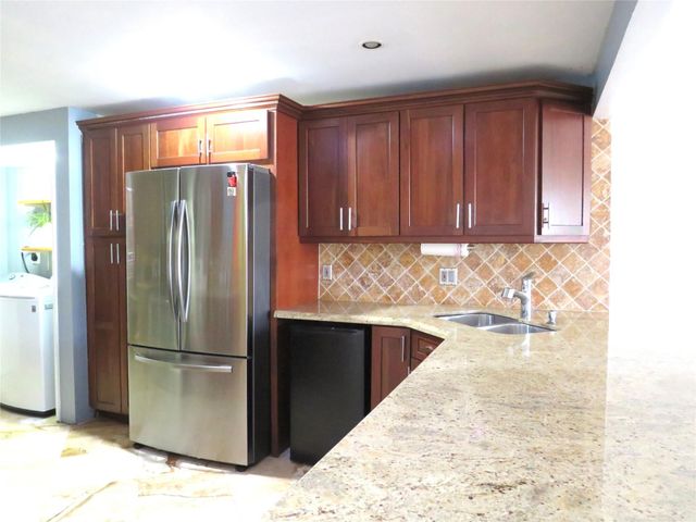 2601 S Palm Aire Drive, Pompano Beach, FL 33069